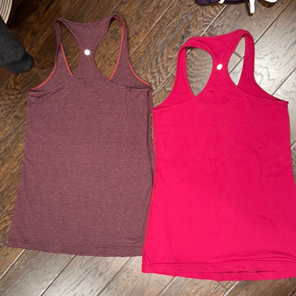 2 Lululemon cool racer back tank, size 8 maroon/purple stripe and pomegranate